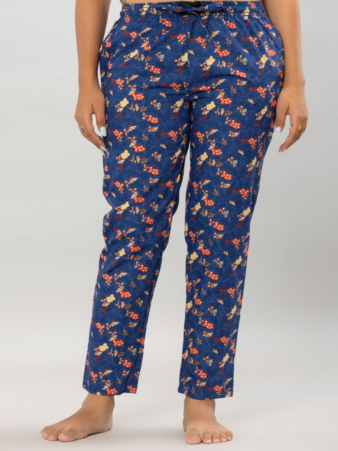Woman Relaxing in Flamboyant Floral Print Blue Pajama